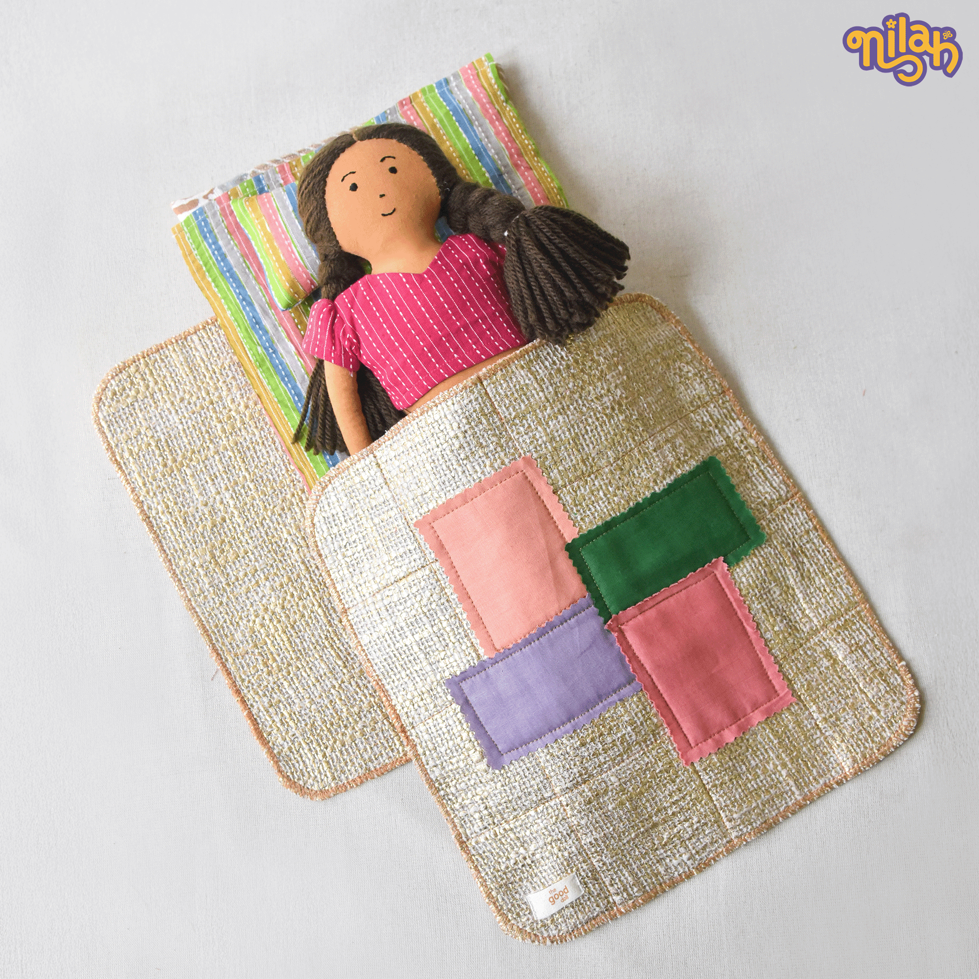 Nilah inside her cozy bed