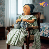 Paati knitting a sweater for the winters