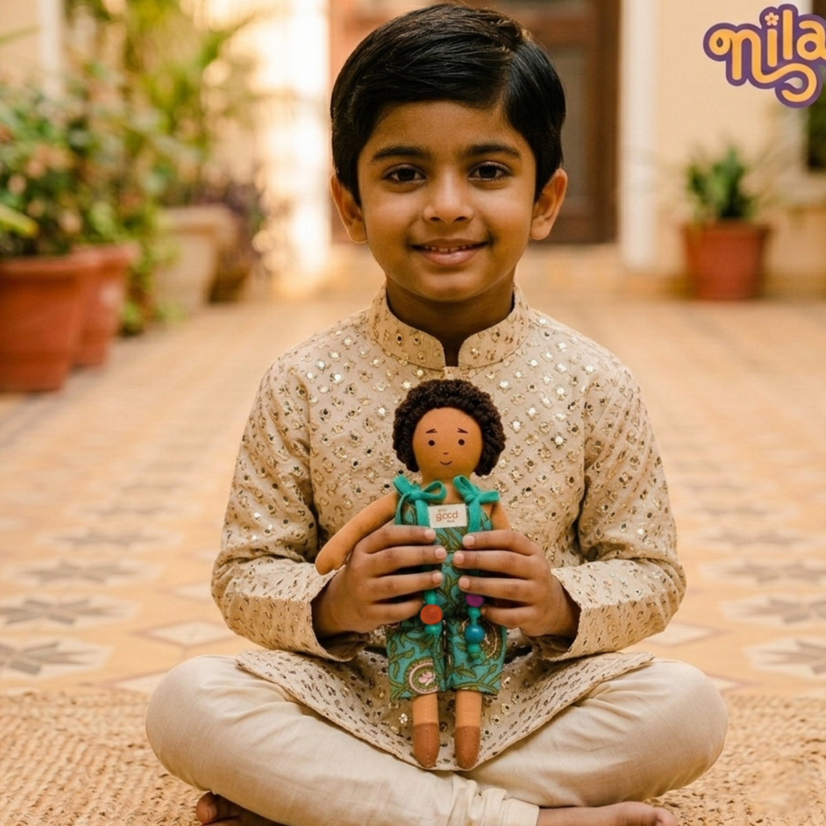 Raagu – Handmade Soft Doll for Kids in Teal Patterned Romper