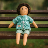 Raagu sitting on a bench