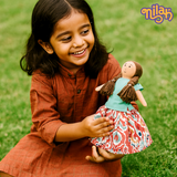 Nilah sitting in her front yard