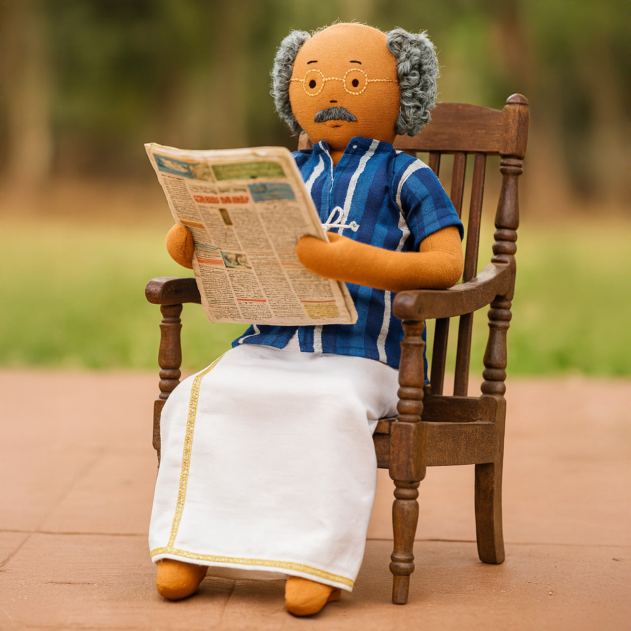 Thatha reading his favourite newspaper