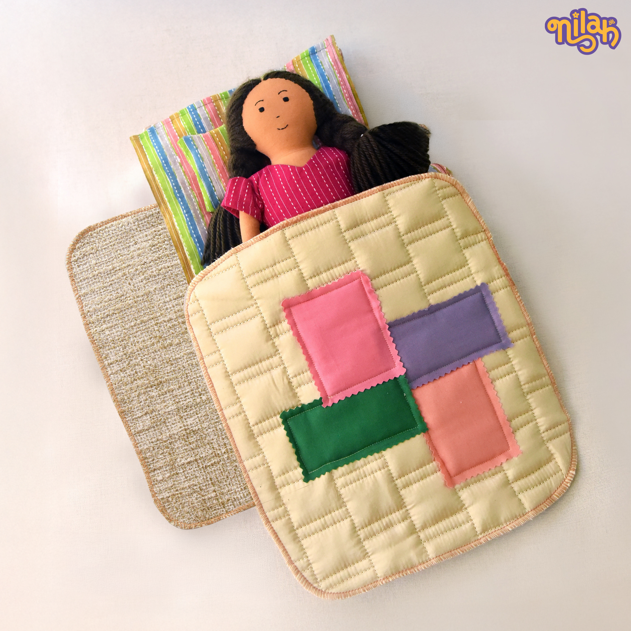 Nilah inside her cozy bed