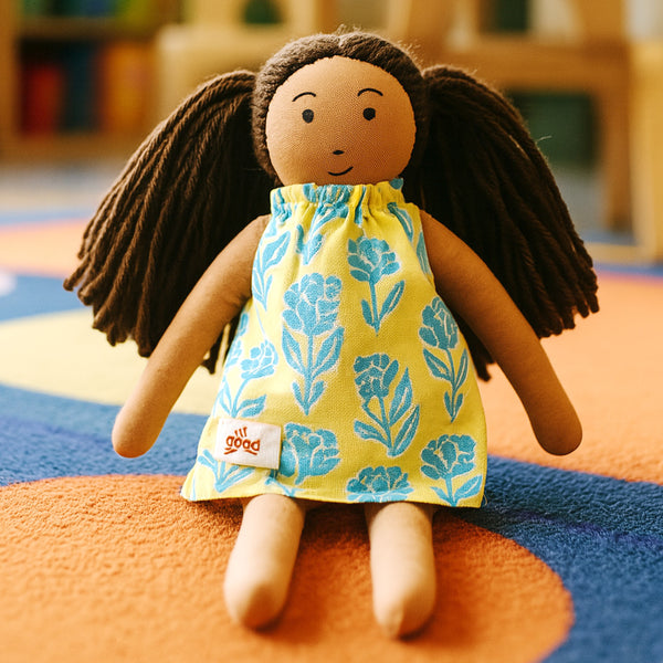 Mira - Nilah’s Younger Sister in a Green Baby Dress