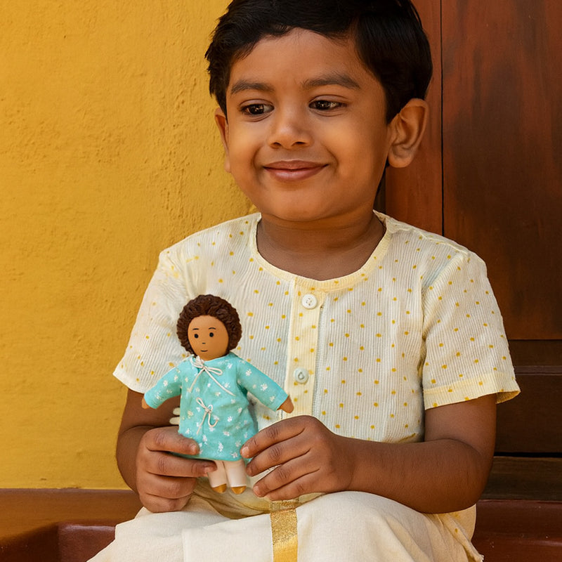 Raagu - Nilah’s younger brother in Blue Kurta