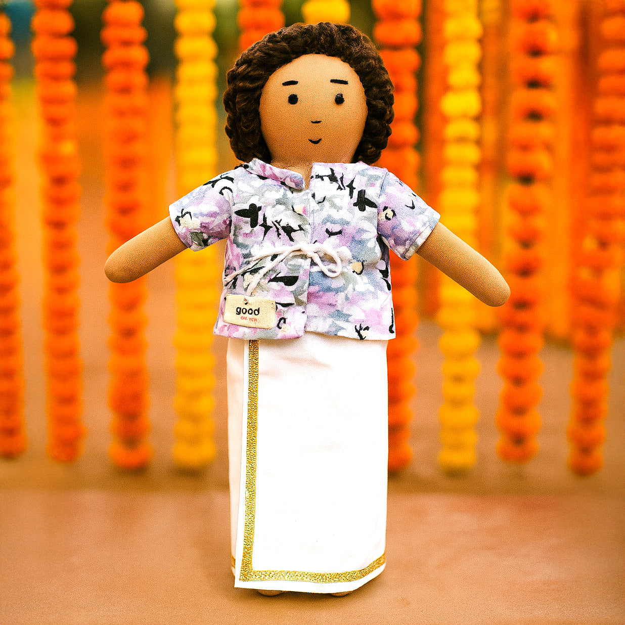 Raagu playing mischief with festival flowers